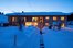 Fassade beleuchtetes Holzhaus im Schnee am Erlenhof in Bad Hindelang 