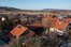 Luftaufnahme des Biohof Neihausmo in Böbing mit Aussicht in den Pfaffenwinkel